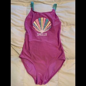 Cute, pink bathing suit by Cat & Jack. Girls size L (10-12).